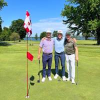 Adam with Doc Redman and Jonas Blixit at Elk Rapids Golf Club
